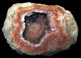 Cream, grey, orange, red, rich browns, white, yellow. Interior British Columbia Mineral Sales