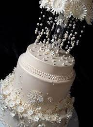 Unique Wedding Cake Decorated With White Flowers And Pearls Unusual Wedding Cakes Cool Wedding Cakes Amazing Wedding Cakes