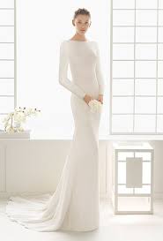 Brides Com Wedding Dresses With Long Sleeves From The Bridal Runways Tilly Off The Should Wedding Dresses Minimalist Wedding Dresses Wedding Dress Long Sleeve