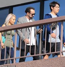 Cage, 52, met kim, 32, in february 2004 when she served him while working as a waitress in a los angeles restaurant. Nicolas Cage 55 Is Seen Shopping With His Third Wife Nicolas Cage Nicolas Alice Kim