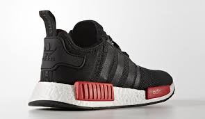 Nmd by adidas originals built from the nomadic spirit of the adidas originals archives, the nmd r1 surfaced as an immediate wardrobe staple upon release. Adidas Nmd Black Red White Sneakerfiles