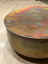 There will be an extended lead time for the 72″ round top. Round Hammered Copper Table The Main Company