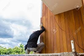 Check spelling or type a new query. Men Build Siding Fiber Cement Board On Wall Exterior Stock Photo Picture And Royalty Free Image Image 62918587