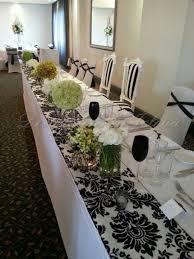 Modern Black And White With A Touch Of Green Wedding Reception Decor White Wedding Theme Wedding Table Designs Green Wedding Inspiration