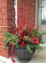 See more ideas about christmas porch, christmas porch decor, christmas decorations. 20 Beautiful Christmas Porch Decorating Ideas Trendhmdcr Christmas Planters Christmas Urns Outdoor Christmas Decorations
