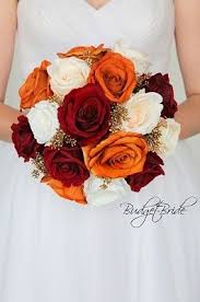 Discover thousands of save the date templates and designs to match your wedding theme! Dark Red Sienna And Ivory Roses With Gold Berries Perfect If You Need Burnt Orange For Yo Orange Wedding Flowers Orange Wedding Colors Wine Wedding Flowers