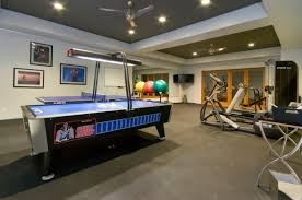 Use Your Game Room Not Just For Games But Also For Fitness Put Some Exercise Machines For An Awesome Game Gym Room Home Gym Design Gym Room Gym Design