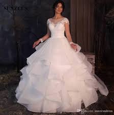 Bestellen sie maßgeschneiderte brautkleider zu günstigen preisen. Grosshandel Ballkleid Brautkleider Mit Organza Ruschen Rock Illusion Hals Schiere Langen Armeln Brautkleid Lange Prinzessin Braut Kleider Von Sunzeusdress 218 12 Auf De Dhgate Com Dhgate