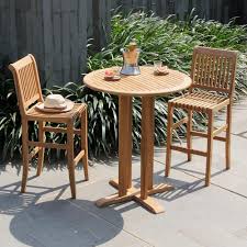 The tabletop and base are connected by a central stem. Cambridge Casual Heaton Teak Wood 3 Piece Bar Height Outdoor Bistro Set 620150 Tw Xx Xx Xx The Home Depot