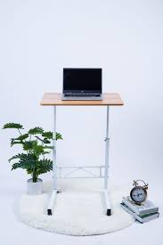 You will note that the cross bed design gives you ample surface area to do your work from the comfort of your bed. China Mobile Bedside Table Rolling Laptop Stand Height Adjustable Computer Table Study Desk With 4 Wheels For Bed Sofa Reading China Mobile Bedside Table Rolling Laptop Table