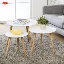 The coffee table is the piece of resistance in the living room. Special Offer White Glossy Round Solid Wood Coffee Table With Solid Three Leg Buy Glass Coffee Table Cross Leg Coffee Table Solid Wood Coffee Table Product On Alibaba Com