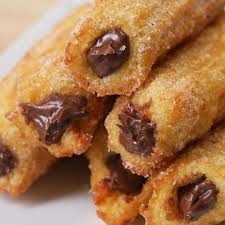 Double Chocolate Stuffed Mini Churros Mini Churros Rellenos De Chocolate Recipe By Tasty Dessert Recipes Desserts Yummy Food Dessert