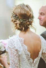 Wedding Hairstyle Idea Low Bun With Flower Crown Wedding Hairstyles Photos Flower Crown Hairstyle Wedding Hairstyles