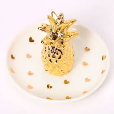 A pretty little gold pineapple tray to bring some glam to your home. Pineapple Hearts Jewelry Holder Tray White Claire S