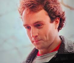 Discussion of a character's appearance in The Handmaid's Tale