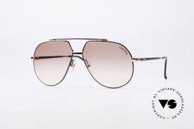 Eine herren sonnenbrille von carrera mit getönten gläsern wirkt in form einer pilotenbrille besonders maskulin. Sonnenbrillen Carrera 5369 90er Herren Sonnenbrille