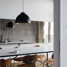 Whether you are inspired by the mirrored walls of a vintage, french café or just want to add the illusion of more space to your small kitchen, a mirrored backsplash might be just the answer to your design woes. Man In The Mirror Antiqued And Colored Mirrors From A Los Angeles Designer Remodelista