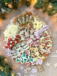 Your kids will have a ball applying their cookie decorating skills to these fun pizzas. Kid S Christmas Snack Board Blog Gathered Living