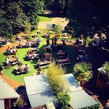 The Score Of Picnic Tables In This Huge Garden Are Serviced By A Purpose Built Outdoor Kitchen That S Bigger Than With Images Build Outdoor Kitchen Beer Garden London Life