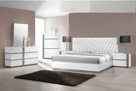 A queen bedroom set in white creates a bright, clean aesthetic. Bedroom Set Modern White Bedroom Furniture Bedroom Set Up