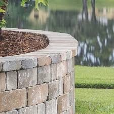 Just use cheap pavers, but the heat will eventually make them crumble and/or explode. Retaining Wall Blocks Landscape Patio Stone Retaining Walls Pavers