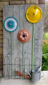 And that means grabbing every junky thing i can find and filling it with flowers. Junk Garden Garden Art Diy Yard Art Diy Garden Decor