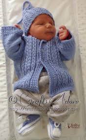 The body and sleeves feature a pretty cable pattern. Handsome Cables Knitted Baby Boy Cardigan Free Knitting Pattern Baby Boy Knitting Patterns Knitting Patterns Boys Baby Cardigan Knitting Pattern