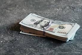 Future value of $1 ordinary annuity (annuity in arrears). Gallereplay Stack Of Banknotes On Table