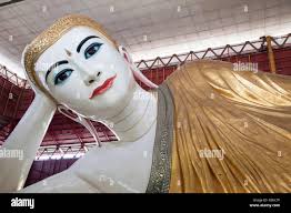 Lying buddha statue hi-res stock photography and images