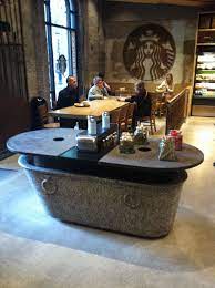 A Bathtub That Also Serves As A Condiment Bar Checkity Check At Starbucks Las Ramblas In Barcelona Starbucks La Rambla Coffee Shop