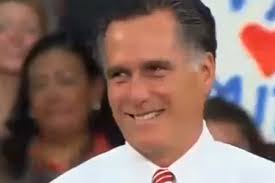 Watch Romney grin awkwardly as his audience shouts down climate activist