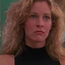 Yellow Cardigan, White Blouse and Black Skirt worn by Heather McNamara  (Lisanne Falk) in Heathers