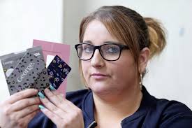 Woman claims she was given shopping gift cards during informer approach