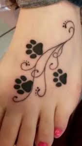 3 cat shoulder blade tattoos. 15 Coolest Unusual Paw Print Tattoo Designs Styles At Life