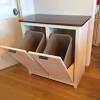 Your kitchen may have a tall built in drawer for garbage. 1
