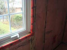 I actually got to see this house a few weeks later, and they'd had to go in and cut the siding back around the whole opening to make it work. Window Vapor Barrier Install 2 Installation Of Vapor Barri Flickr