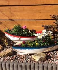 Dark red) 4.5 out of 5 stars. Dory Boat Planters