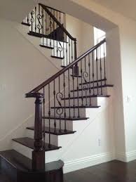 Many prefer to use wooden treads within their stairs because it offers great traction force along with a classic feel in your stairway design and style. Wrought Iron Railing Houzz Wrought Iron Staircase Wrought Iron Stairs Wrought Iron Stair Railing