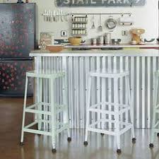 A blue stone top is perfect for prepping meals. 15 Corrugated Metal Ideas Corrugated Metal Metallic Backsplash Tin Backsplash Kitchen