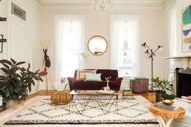 This is a small living room given the illusion of a bigger space thanks to its tall window that has a dark frame making the golden chandelier stand out. 36 Small Living Room Ideas How To Design Decorate A Small Living Room Apartment Therapy