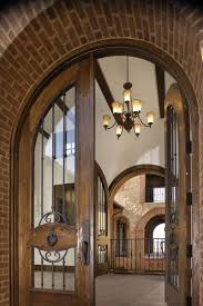 The Tides At Crystal Cove In Newport Coast The Front Door Opens To Another Set Of French Doors Tha Arched Front Door Standard Pacific Homes New Home Builders