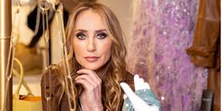 A female exec introduced 'Sally,' a portable fan, to her male coworkers  when she started having hot flashes. She's among women at 20% of companies  offering menopause benefits