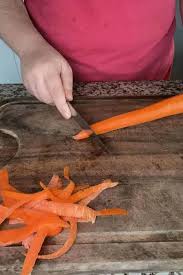 Now i have a peeled carrot here and the first thing we are going to do is we are going to trim off the edge. How To Julienne A Carrot
