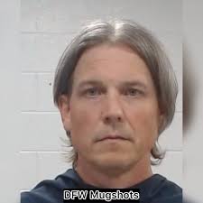 A man named Jason Bartik, 45, has been charged with murder following a road  rage shooting in the parking lot of Frisco High School. The incident, which  occurred