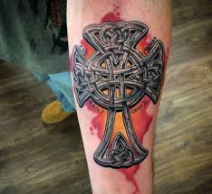 A celtic cross tattoo with a profound saying running through it. 100 Celtic Cross Tattoo Designs Pictures With Meanings 2021