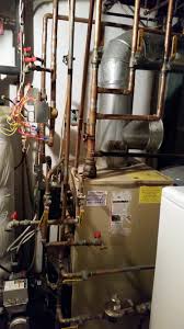 Usually the expansion tank is hung from the basement ceiling, not far from the boiler. How Do I Bleed Hot Water Baseboard System When Zone Valves Drain Valves And Pump All On One Side Heating Help The Wall