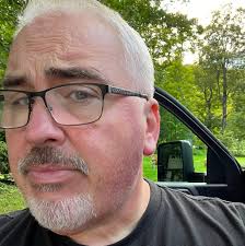 Staircase with banisters carved to resemble outstretched crow wings