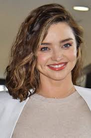 Elegant updo is the hair style all the hairs are locked up on the back side of the head and above cervix. Miranda Kerr S Hairstyles Hair Colors Steal Her Style