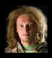 His name is Bill. He has wild hair, wears a T-shirt with holes in it,  jeans, and no shoes. This was literally his wardrobe for his entire four  years of college. He