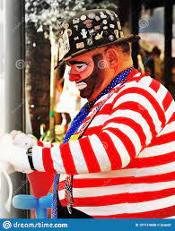 The Clown Is Preparing For The Show By Getting His Props Ready Editorial Stock Photo Image Of Party Carnival 157114838
